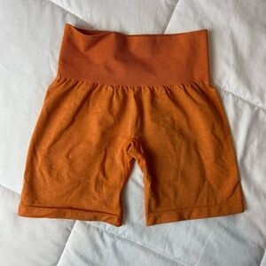 NVGTN Burnt Orange Pro Seamless Shorts